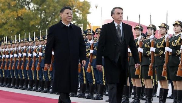 Chinese President Xi Jinping holds a welcome ceremony for Brazilian President Jair Messias Bolsonaro before their talks at the Great Hall of the People in Beijing, capital of China, Oct. 25, 2019.