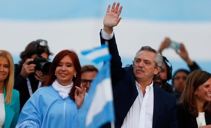 Argentina's presidential candidate Alberto Fernandez and his running mate, former President Cristina Fernandez, greet supporters during a closing campaign rally in Mar del Plata, Argentina, on October 24, 2019.