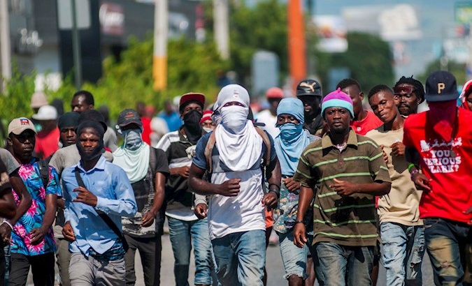 Workers, teachers and students demand the resignation of President Jovenel Moise in Puerto Principe, Haiti, Oct. 28, 2019.