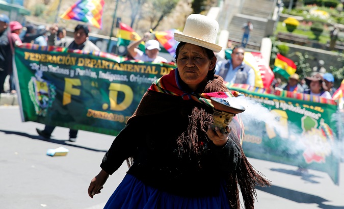 Indigenous woman takes part in a march to support President Evo Morales in La Paz, Bolivia, October 30, 2019.