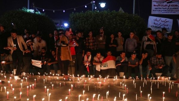 Demonstrators light up candles for the people killed at an anti-government protest in Iraq, in the holy city Kerbala, Iraq November 2, 2019.