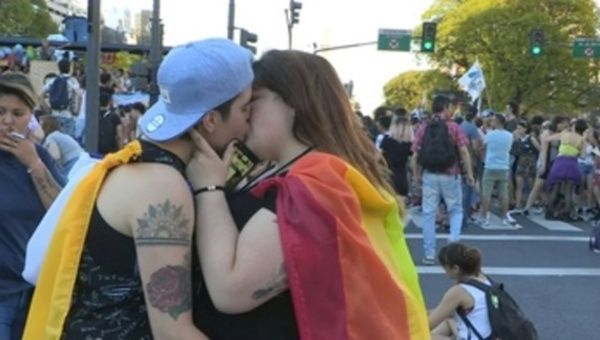 A lesbian couple kissing during the march on Sunday in Buenos Aires.