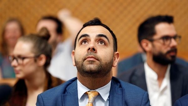 Omar Shakir, Human Rights Watch Israel and Palestine Director, looks up before his hearing at Israel's Supreme Court in Jerusalem September 24, 2019.