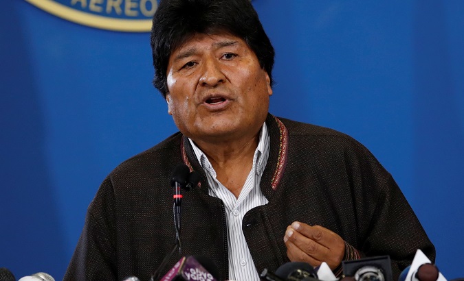 President Evo Morales addresses the media in the Bolivian Air Force terminal, El Alto, Bolivia, Nov. 9, 2019.