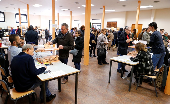 People queue to vote during general election in Barcelona, Spain Nov. 10, 2019.