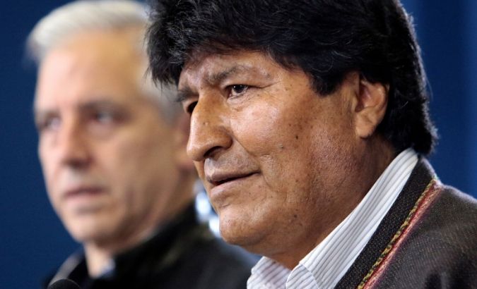 Bolivia's President Evo Morales addresses the media next to Vice President Alvaro Garcia Linera, at the presidential hangar in the Bolivian Air Force terminal, in El Alto, Bolivia November 9, 2019.