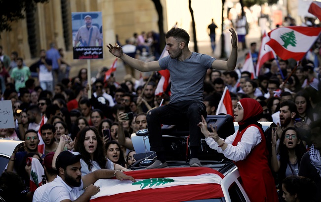 Protesters chant slogans as they march at a demonstration organised by students during ongoing anti-government protests in Beirut, Lebanon November 12, 2019.