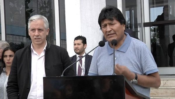 Evo Morales (R) and Alvaro Garcia-Linera (L) upon their arrival at Mexico City, Nov. 12, 2019.