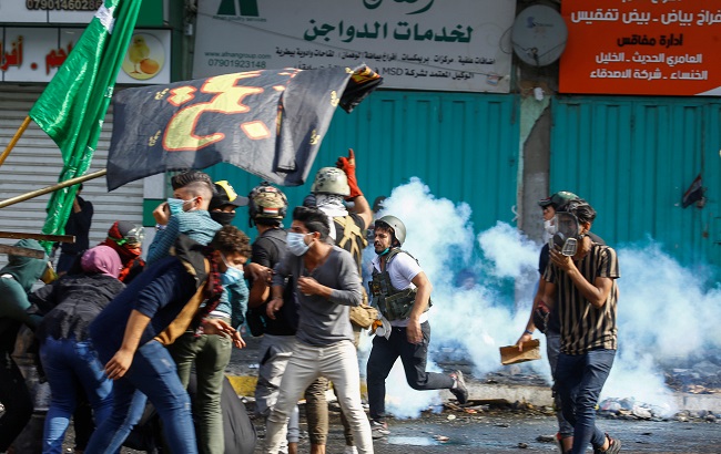 Iraqi demonstrators take part in ongoing anti-government protests in Baghdad, Iraq November 14, 2019.