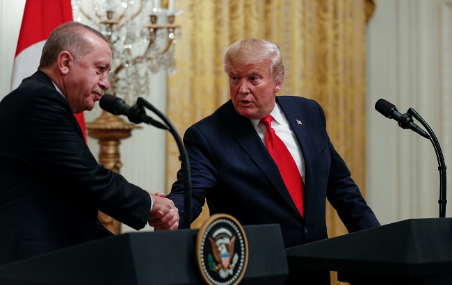 U.S. President Donald Trump and Turkish President Tayyip Erdogan shake hands during a joint news conference at the White House in Washington, November 13, 2019.