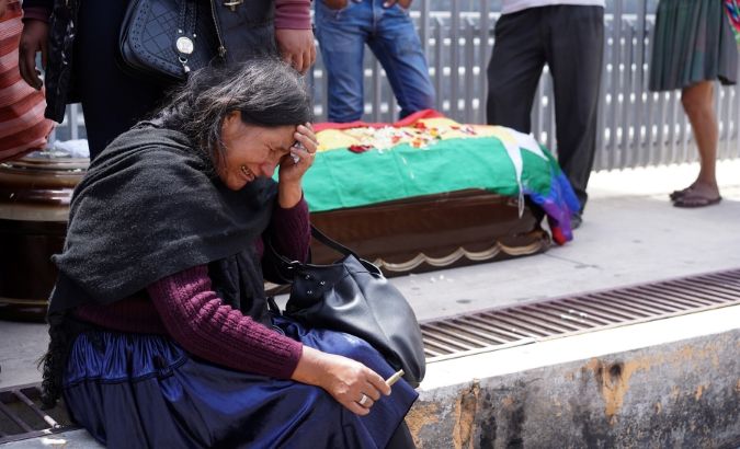 A woman reacts near the coffin of a supporter of former Bolivian President Evo Morales, who died during clashes on Friday, in Cochabamba, Bolivia, November 16, 2019.