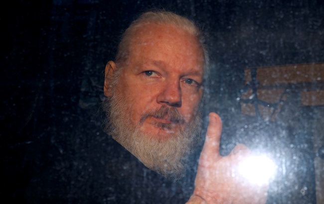 WikiLeaks founder Julian Assange is seen as he leaves a police station in London, Britain April 11, 2019.