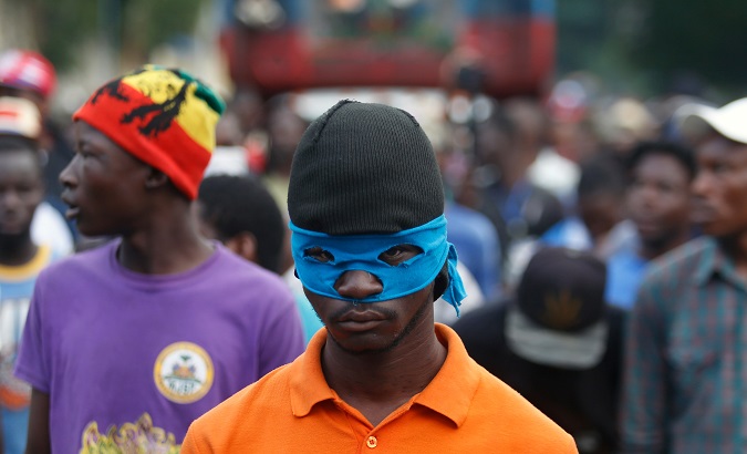 Demonstrators protest to demand the resignation of President Jovenel Moise in Port-au-Prince, Haiti Nov. 18, 2019.