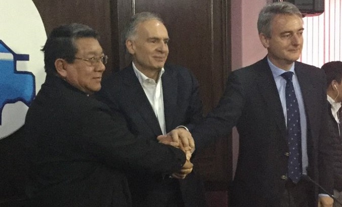 Monsignor Aurelio Pesoa (L), UN envoy Jean Arnault (R) and EU ambassador Leon De la Torre (C) in La Paz, Bolivia, Nov. 23, 2019.