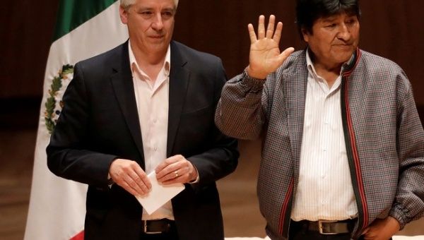 Bolivia's former President Evo Morales gestures next to former Vice President Alvaro Garcia Linares, in Mexico City, Mexico November 26, 2019.