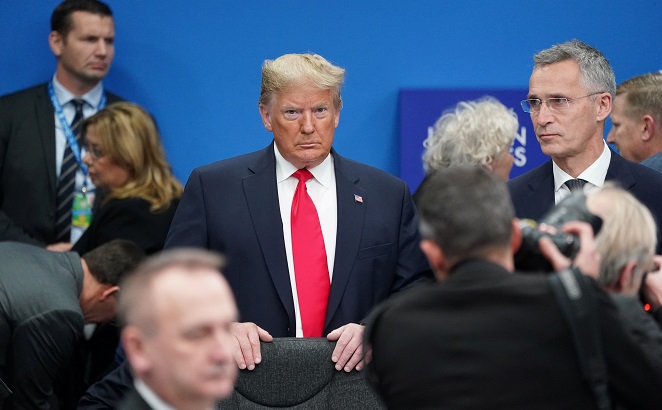 U.S. President Donald Trump stands among other leaders as he attends a North Atlantic Treaty Organization Plenary Session at the NATO summit in Watford, near London, Britain, December 4, 2019.