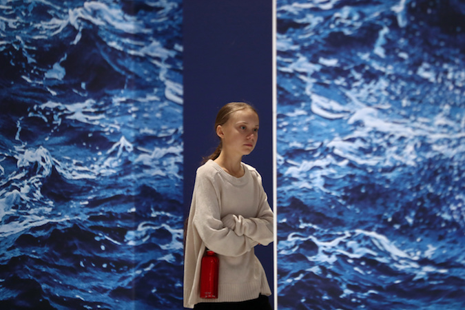 Climate change activist Greta Thunberg arrives to attend the Unite Behind the Science event during COP25 climate summit in Madrid, Spain, December 10, 2019.