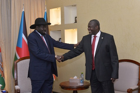 South Sudan's President Kiir and Machar, former VP and rebel leader, shake hands after their meeting in Juba.