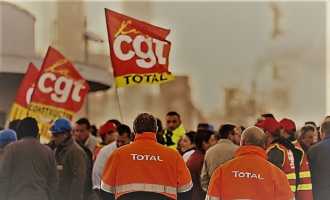 French workers of the General Confederation of Labor (CGT) during a demonstration on Dec. 24, 2019.