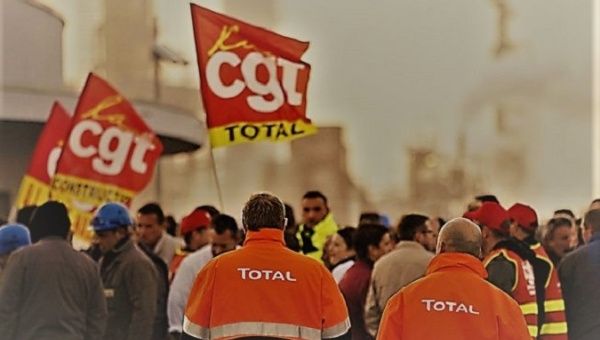 French workers of the General Confederation of Labor (CGT) during a demonstration on Dec. 24, 2019.