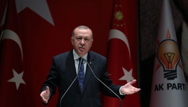  Turkish President Tayyip Erdogan speaks during a meeting of his ruling AK Party in Ankara, Turkey, December 26, 2019. 