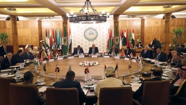 Permanent representatives of the Arab League take part in an emergency meeting at the League's headquarters in Cairo.