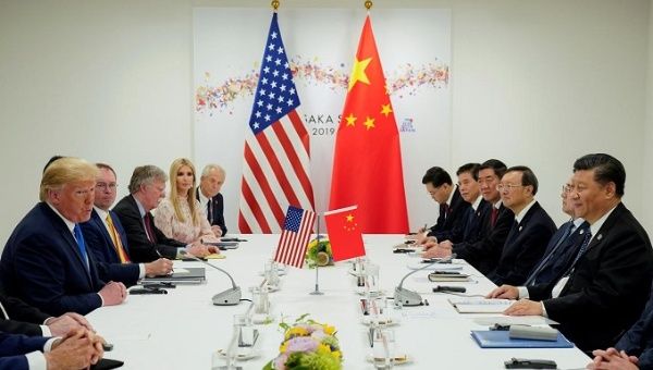 The agreement is expected to reduce fees and boost Chinese purchases of American agricultural, energy and manufactured products