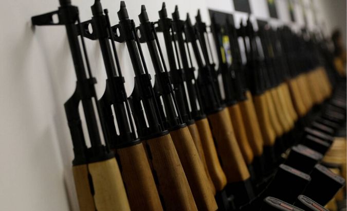 Weapons are displayed during the presentation of guns which were seized in Rio de Janeiro's international airport, Brazil, June 1, 2017.