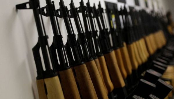 Weapons are displayed during the presentation of guns which were seized in Rio de Janeiro's international airport, Brazil, June 1, 2017.