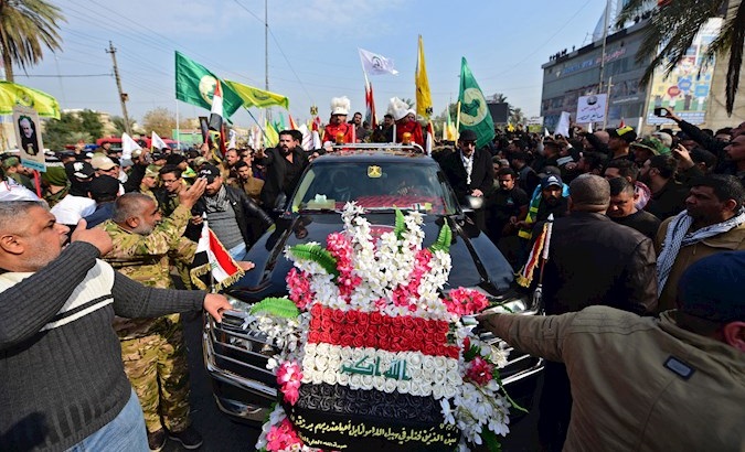 People attend a funeral procession of Abu Mahdi al-Muhandis and Qassem Soleimani in Baghdad, Iraq, 04 January 2020.
