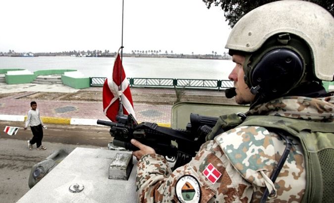 File Photo: Danish troops patrol in southern Iraq.