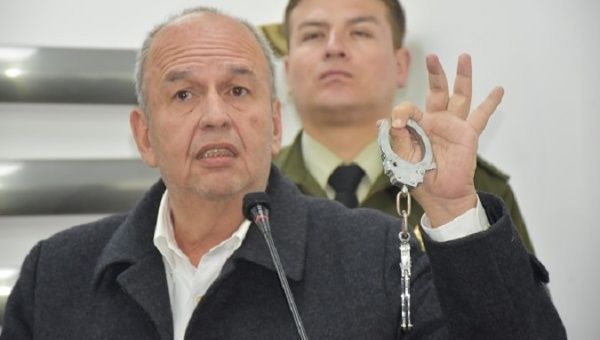 Interior Minister Arturo Murillo shows shackles while mentioning former President Morales, La Paz, Bolivia, January 8, 2020.