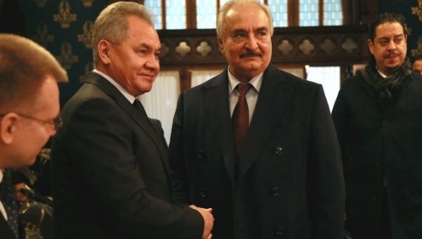 Commander of the Libyan National Army (LNA) Khalifa Haftar shakes hands with Russian Defence Minister Sergei Shoigu before talks in Moscow, Russia January 13, 2020.