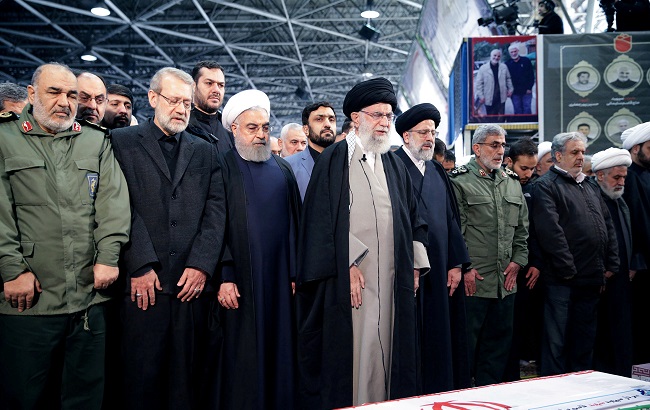 Iran's Supreme Leader Ayatollah Ali Khamenei and Iranian President Hassan Rouhani pray near the coffin of Iranian Major-General Qassem Soleimani, head of the elite Quds Force, who was killed in an air strike at Baghdad airport, in Tehran, Iran, January 6, 2020.