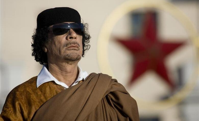 Libyan leader Muammar Gaddafi attends a wreath-laying ceremony in Victory Square in central Minsk, November 3, 2008.