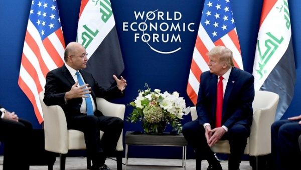 U.S. President Donald Trump meets with Iraq's President Barham Salih during the 50th World Economic Forum (WEF) annual meeting in Davos, Switzerland, January 22, 2020. 