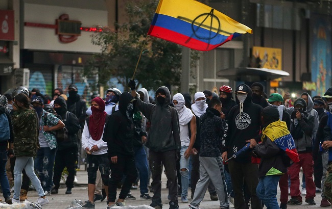 Demonstrators take part in a protest against the government of Colombia's President Ivan Duque, in Bogota, Colombia, January 21, 2020.