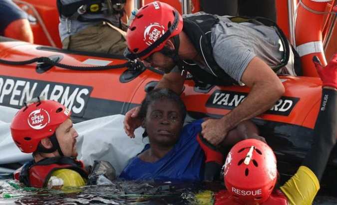 Open Arms staff rescuing African migrants at the Mediterranean sea, Jan. 28, 2020.