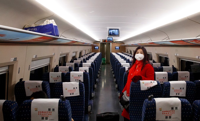Woman travels on a high-speed train near Jiujiang, Jiangxi province, China, Jan. 29, 2020.
