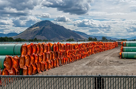 Steel pipe for Canadian government’s Trans Mountain Expansion Project lies at a stockpile site in Kamloops.