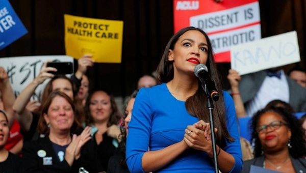 AOC called on the lawmakers to pass legislation she proposed last year to recognize and better fight the issue of poverty in the country.