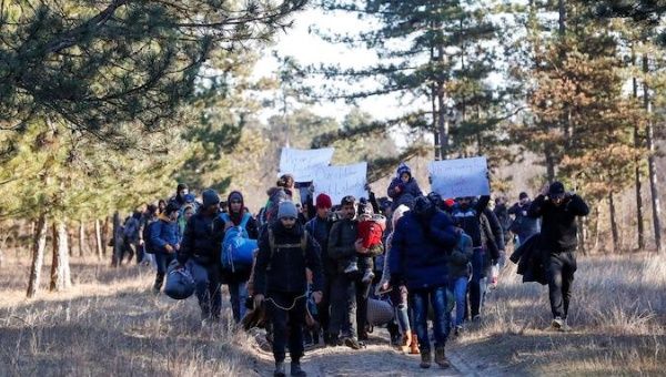 Migrants walk to the Serbian-Hungarian border as they protest to demand a passage to the European Union, near Subotica, Serbia, February 6, 2020.