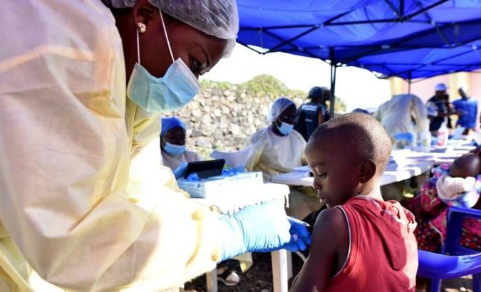 A Congolese health worker administers ebola vaccine to a child at the Himbi Health Centre in Goma, Democratic Republic of Congo, July 17, 2019.