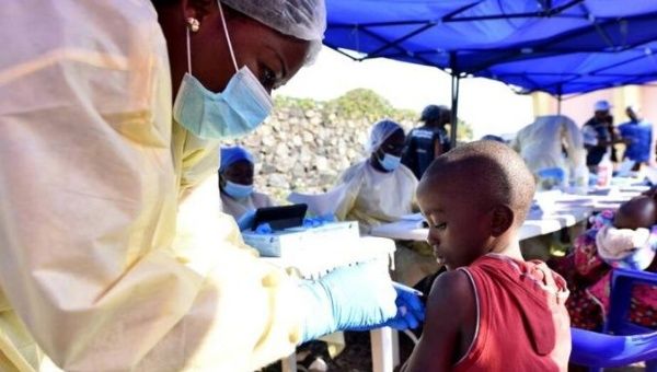 A Congolese health worker administers ebola vaccine to a child at the Himbi Health Centre in Goma, Democratic Republic of Congo, July 17, 2019. 