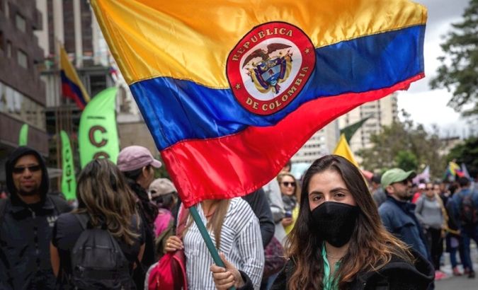 A woman participates in a rally in Bogota(Colombia), during the seventh day of protests in the country.