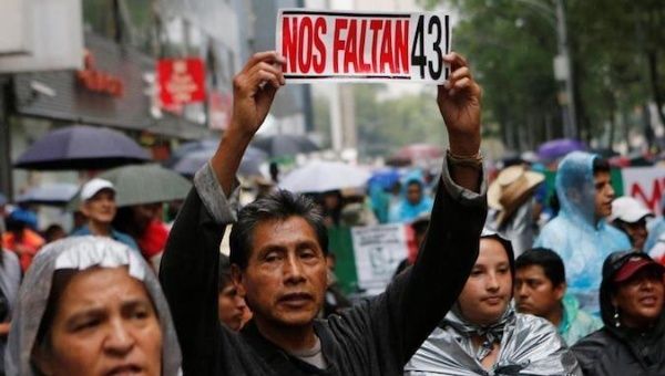 Archive photo of a protest demanding justice for the 43 students killed in Ayotzinapa.