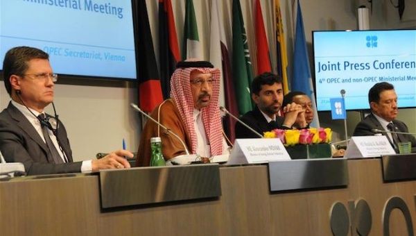 Russian Energy Minister Alexander Novak, Saudi Energy Minister Khalid Al-Falih, Minister of Energy and Industry in United Arab Emirates Suhail Al-Mazrouei and OPEC Secretary-General Mohammed Barkindo (L-R) attend a press conference after a OPEC and non-OPEC oil producers meeting in Vienna, Austria, June 23, 2018.