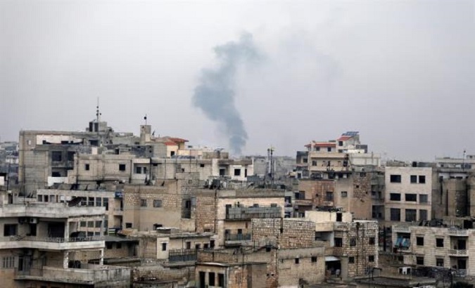 Smoke rises during government forces bombing on the village of Sarman, in Maarrat al-Nu'man district, Idlib, Syria, February 4, 2020.