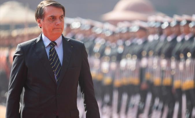 President Jair Bolsonaro walking in front of the troops, Brazil, 2020.