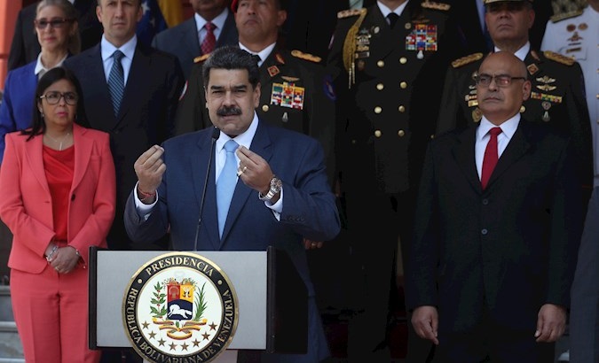 President Nicolas Maduro (C) announces measures to face the Covid-19 outbreak, Caracas, Venezuela, March 12, 2020.